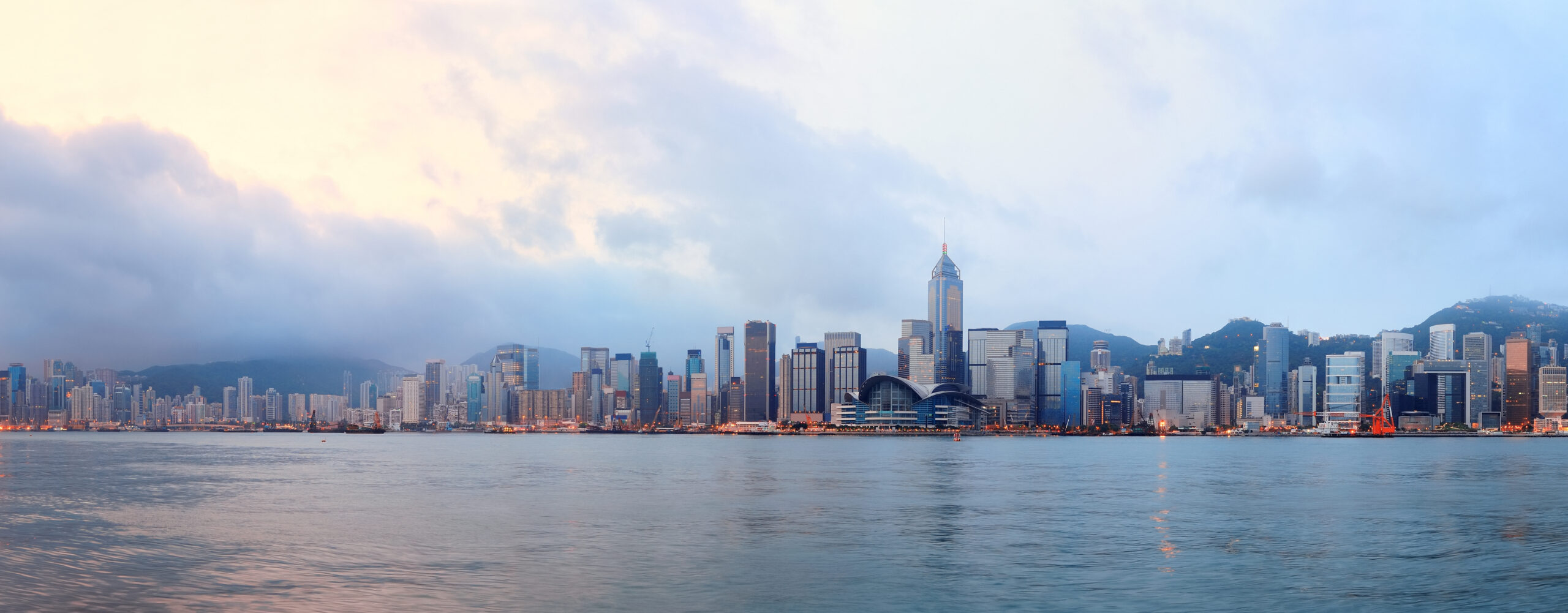 Hong Kong skyline in the morning over Victoria Harbour.